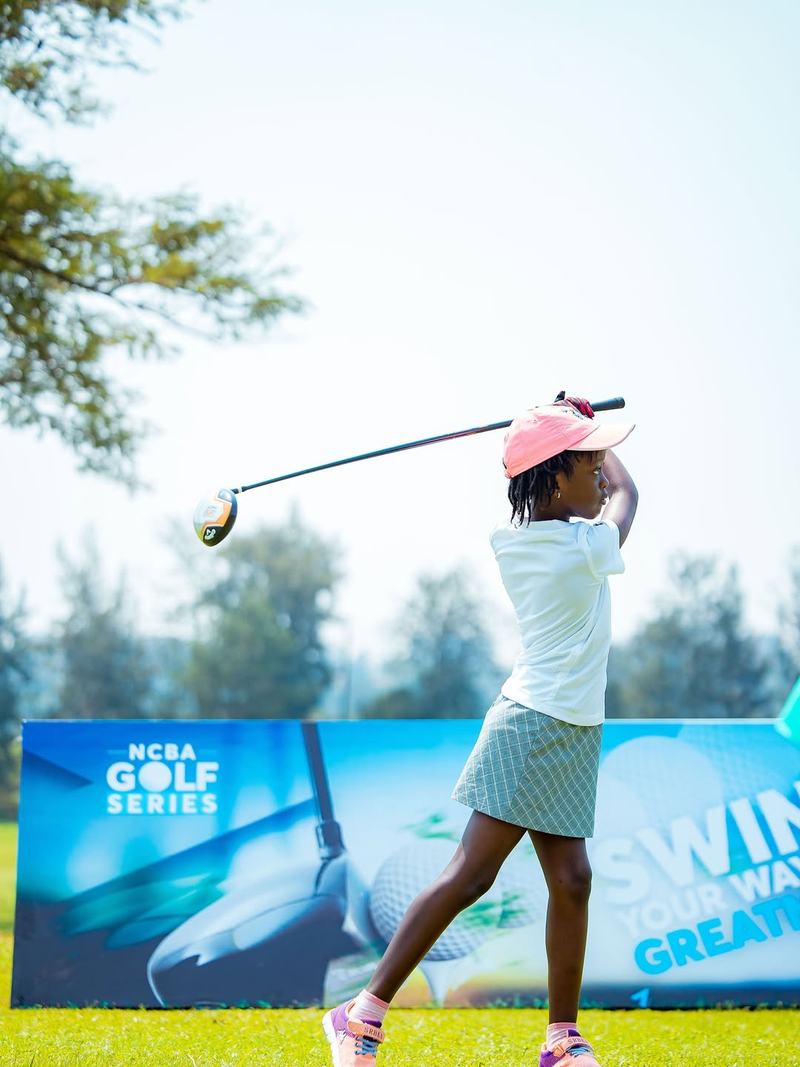 Junior girl swinging at NCBA Golf Series Rwanda Kigali