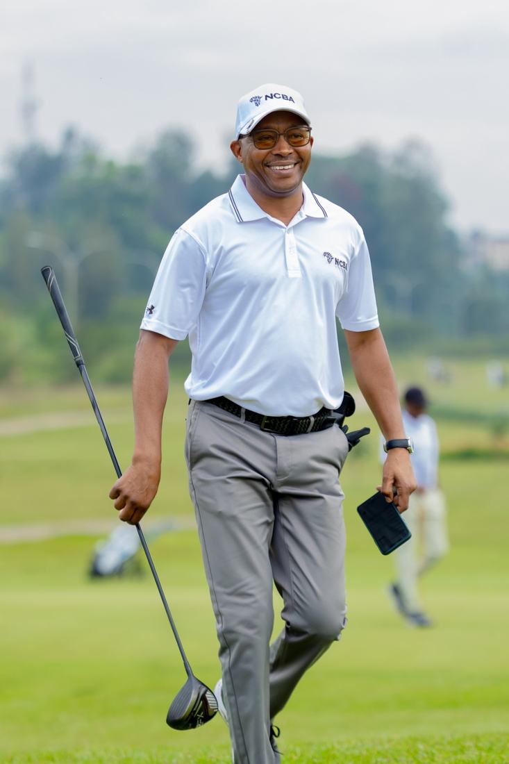 Player walking with club
